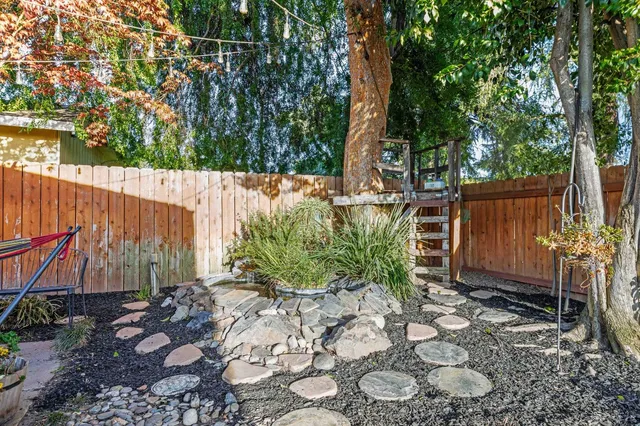 a backyard of a house with lots of green space