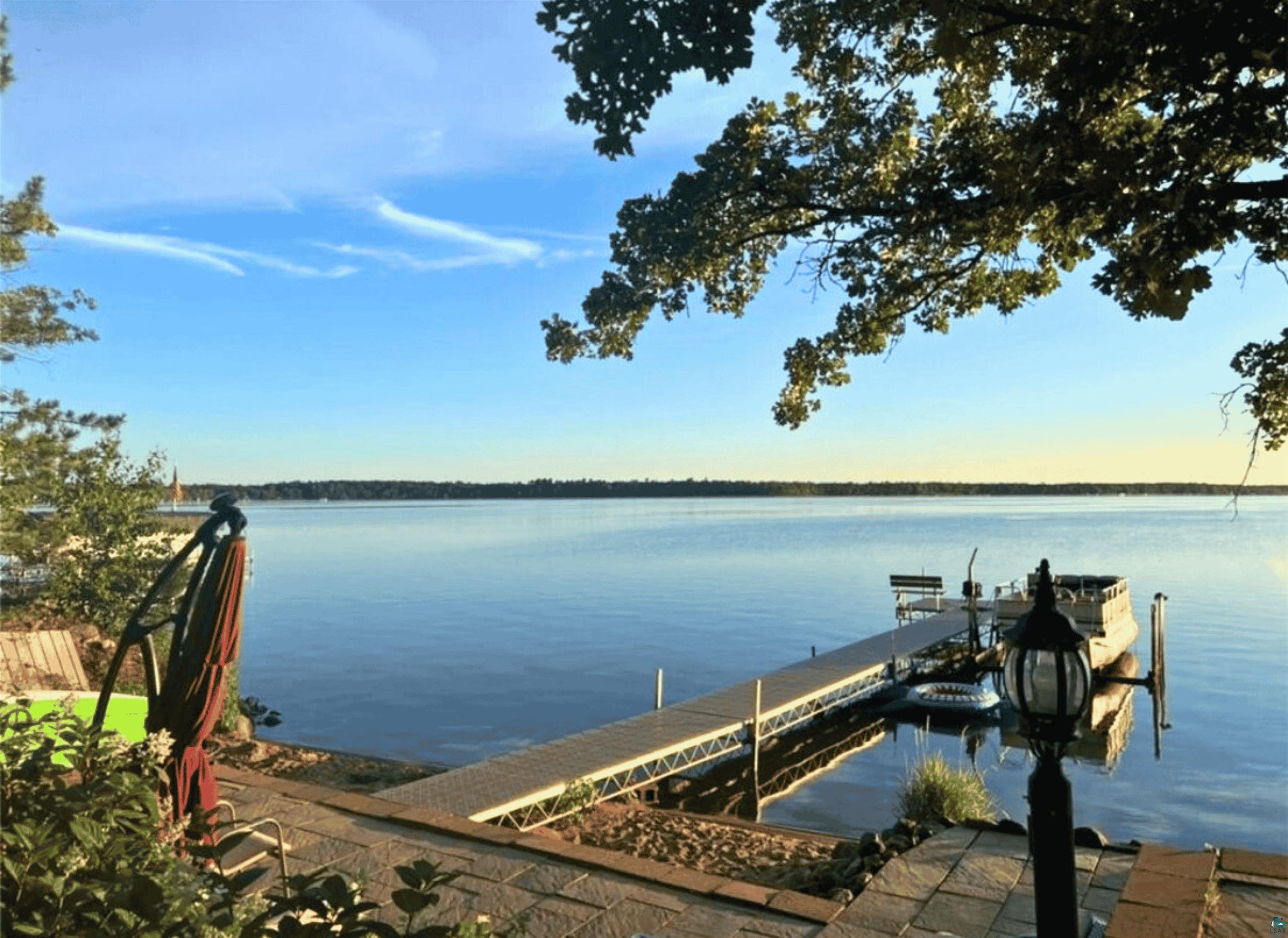 36318 Lakeland Road Sturgeon Lake, MN 55783 - Photo 8 of 23 Dock featuring a water view and boat lift