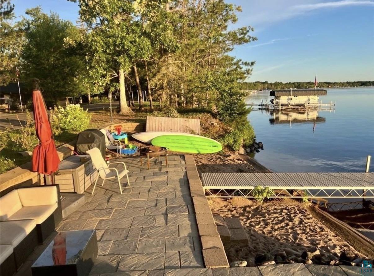 36318 Lakeland Road Sturgeon Lake, MN 55783 - Photo 9 of 23 Dock featuring a water view and a patio area