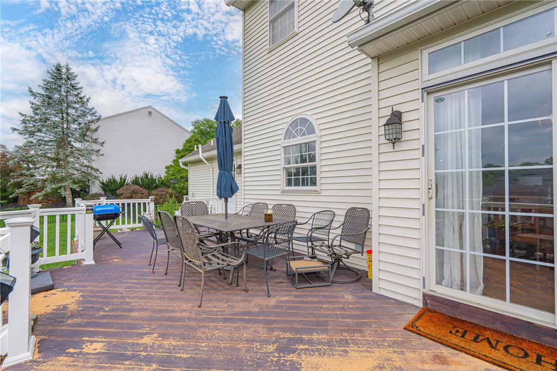 102 Sutton Road Easton, PA 18045 - Photo 67 of 83 An expansive rear deck offers the perfect setting for outdoor relaxation and entertaining.