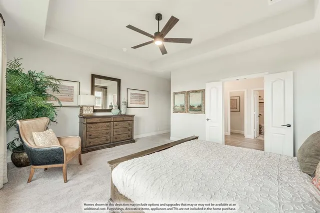 a bedroom with a large bed and furniture