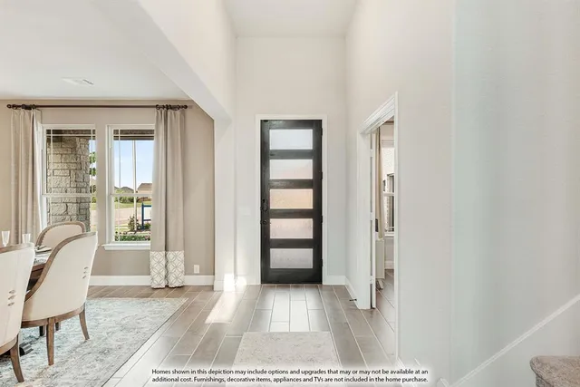 a view of a livingroom with furniture and window