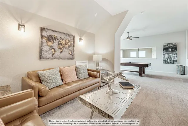 a living room with furniture and a rug