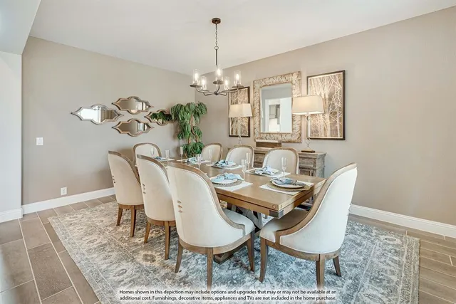 a dining room with furniture a rug and wooden floor