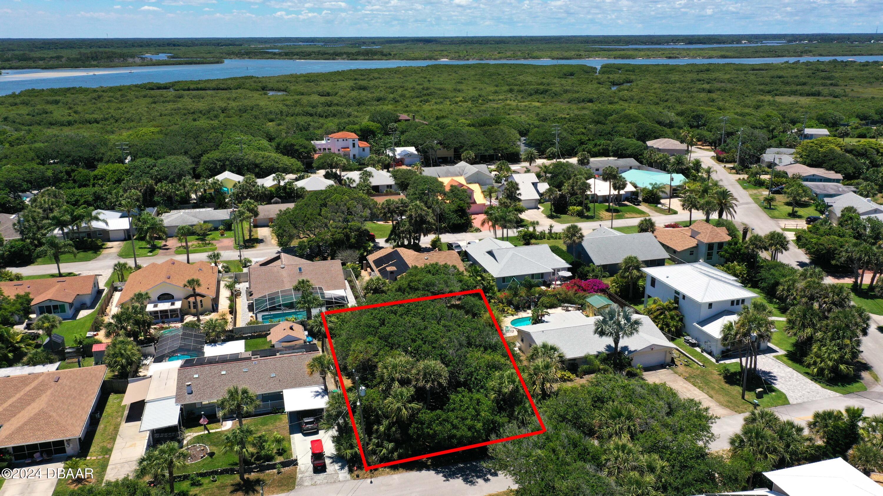4714 Montrose Avenue Ponce Inlet, FL 32127 - Photo 2 of 9 a picture of houses with outdoor space