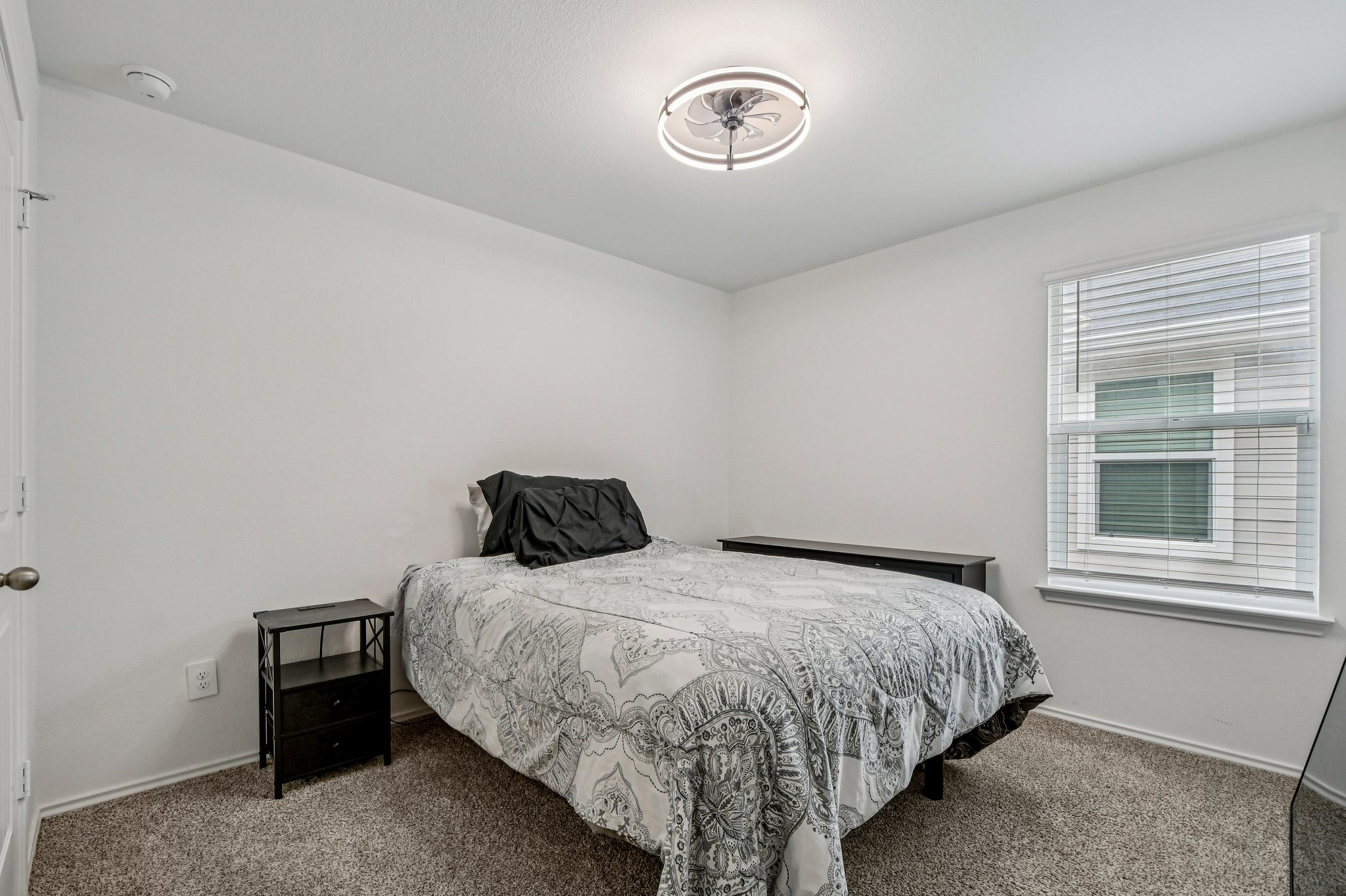519 Sandringham Loop Kyle, TX 78640 - Photo 16 of 32 Bedroom featuring carpet floors