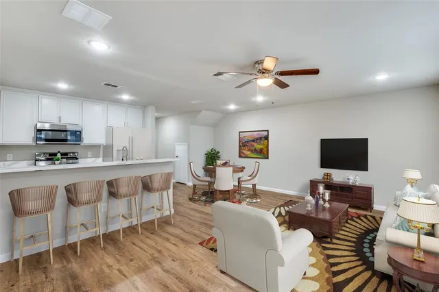 a view of kitchen with wooden floor