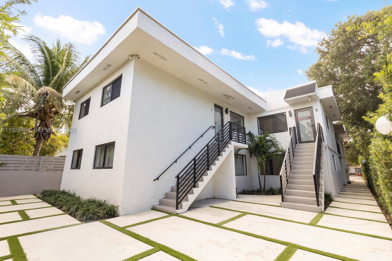 37 Northwest 59th Street, Unit 1 Miami, FL 33127 - Photo 12 of 13 a view of a house with a backyard