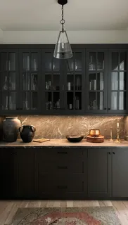 a kitchen with a sink and cabinets