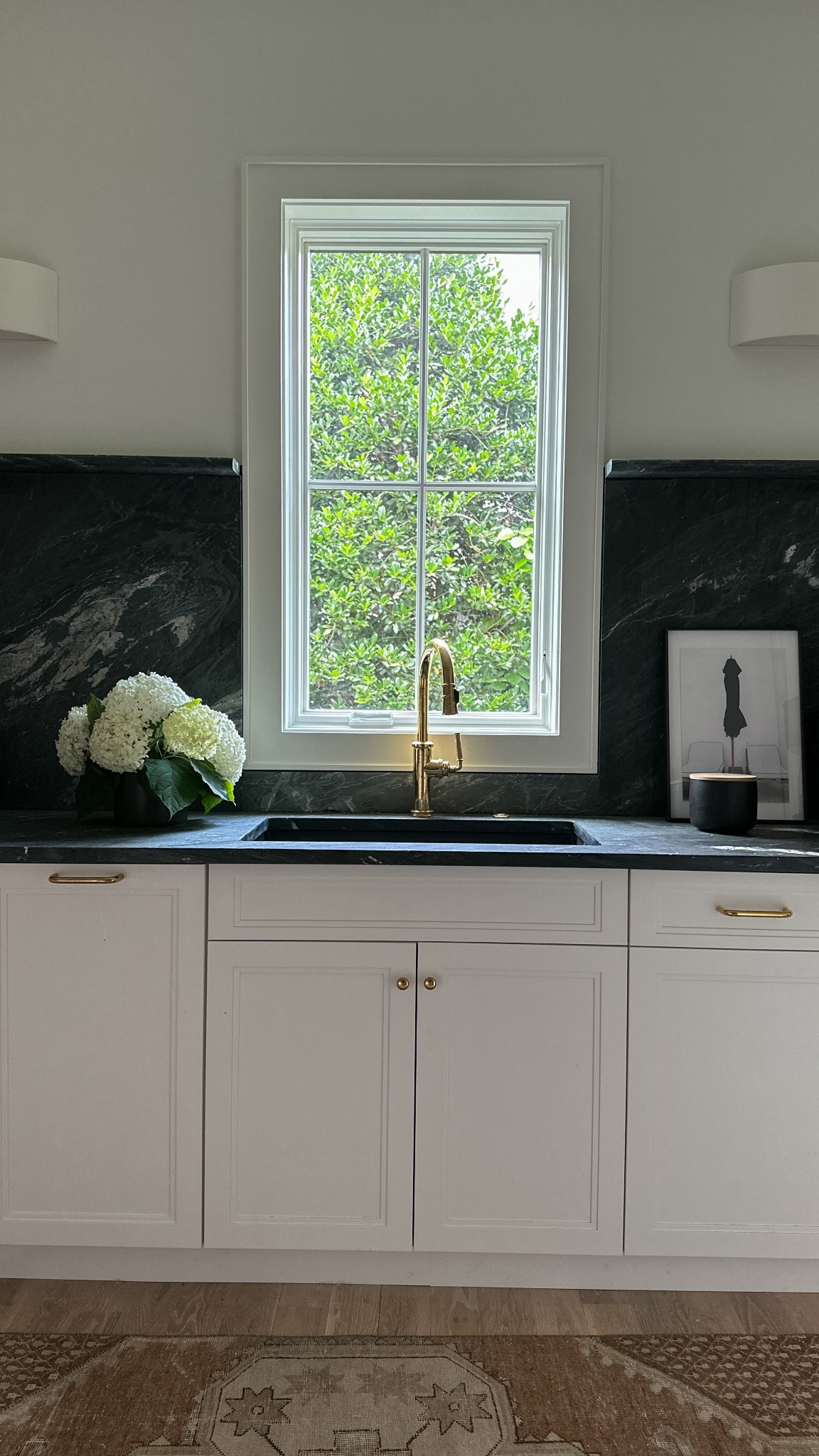 916 Cadillac Avenue Nashville, TN 37204 - Photo 12 of 19 a bathroom with a sink and a window