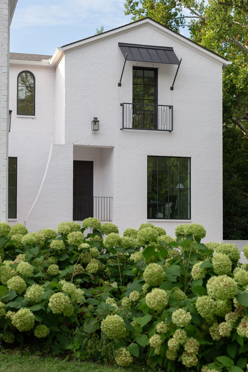 916 Cadillac Avenue Nashville, TN 37204 - Photo 18 of 19 a front view of a house with a yard