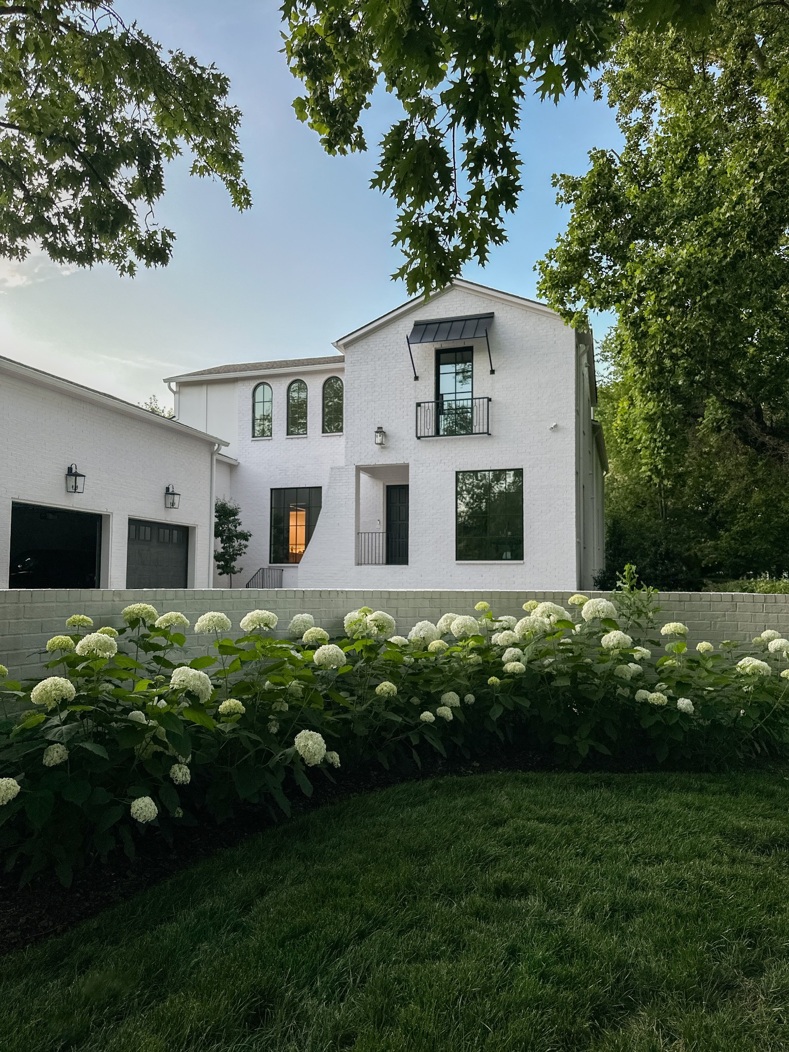 916 Cadillac Avenue Nashville, TN 37204 - Photo 19 of 19 a front view of a house with a garden