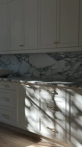 a view of cabinets and wooden floor