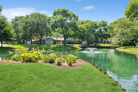 a garden view with a lake view
