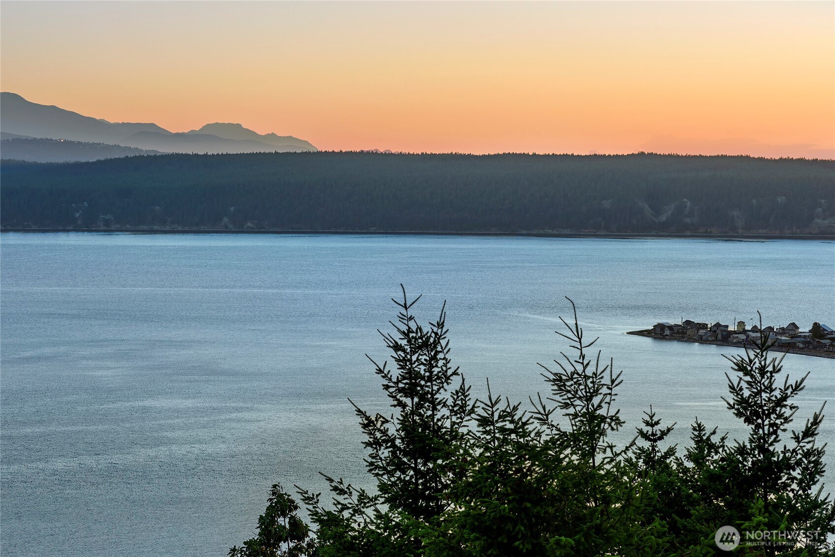 53 Combs Place Port Townsend, WA 98368 - Photo 37 of 40 a view of a lake in middle of the house