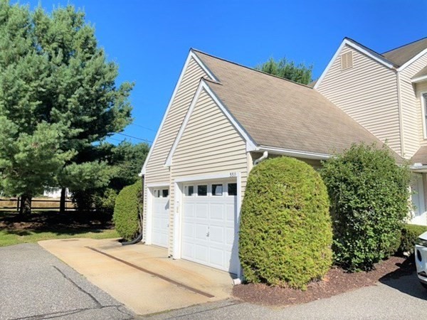 33 Castlegate Drive, Unit B Springfield, MA 01129 - Photo 3 of 18 a view of a house with a yard