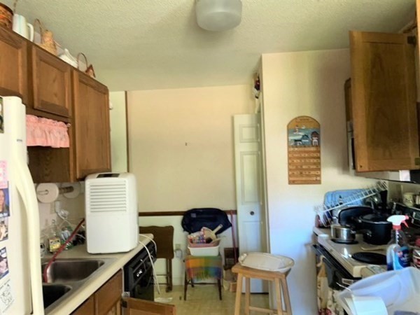 33 Castlegate Drive, Unit B Springfield, MA 01129 - Photo 5 of 18 a bathroom with a sink and a mirror