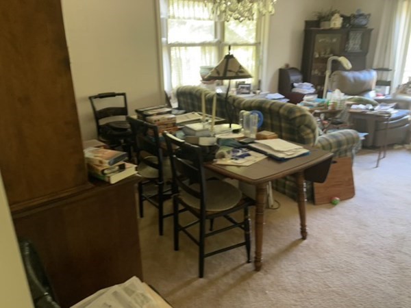 33 Castlegate Drive, Unit B Springfield, MA 01129 - Photo 8 of 18 a view of a dining room with furniture and a window