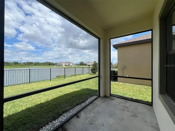 a view of a porch with a yard