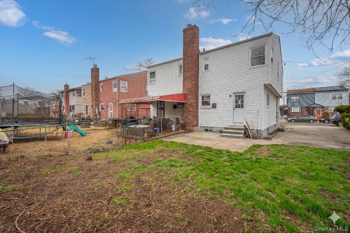 179-49 Zoller Road Queens, NY 11434 - Photo 18 of 21 a view of a patio with a table and chairs
