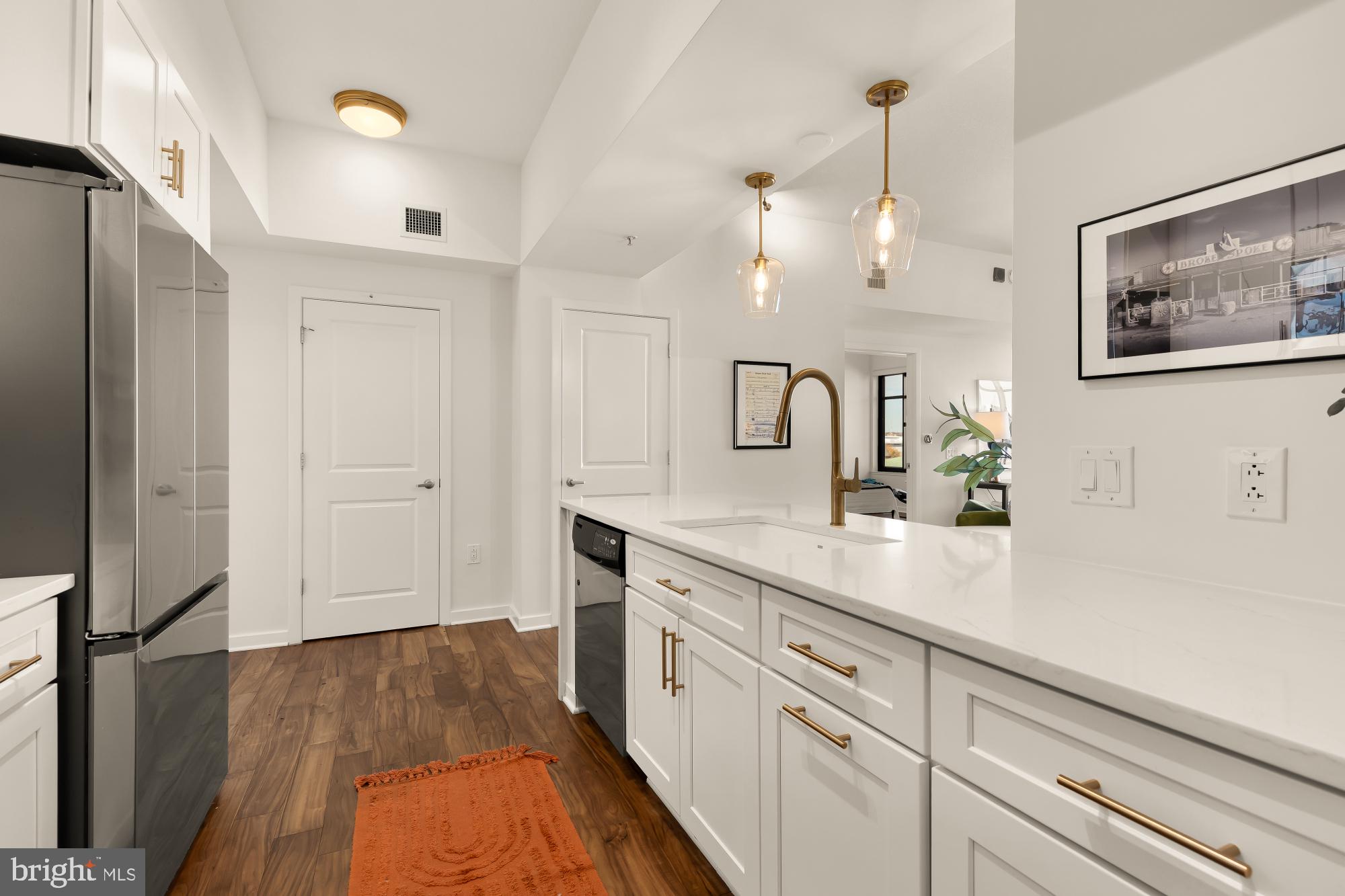 475 K Street Northwest, Unit 1126 Washington, DC 20001 - Photo 11 of 51 a spacious bathroom with a double vanity sink and mirror