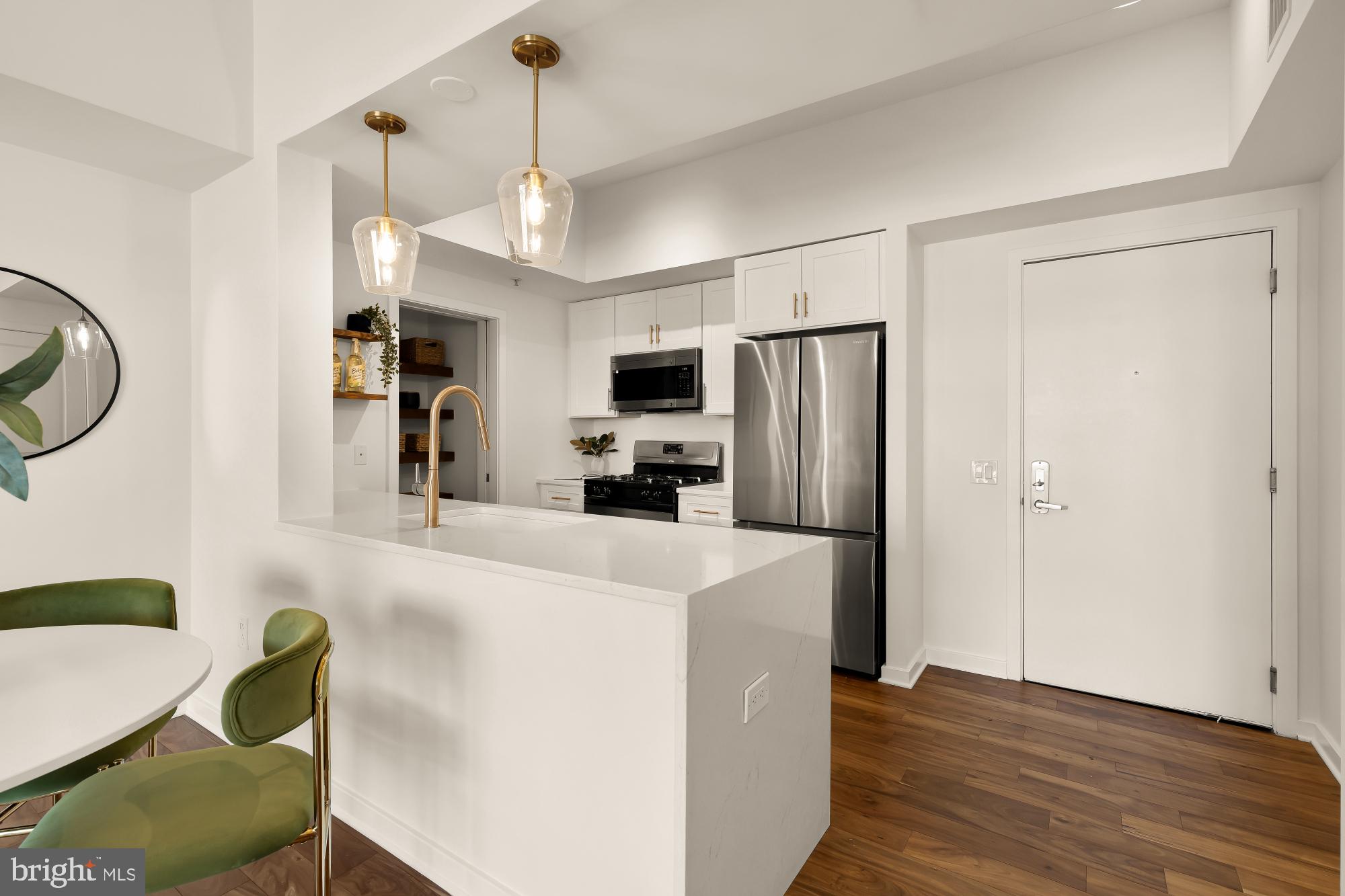 475 K Street Northwest, Unit 1126 Washington, DC 20001 - Photo 12 of 51 a view of kitchen with stainless steel appliances granite countertop cabinets and a refrigerator