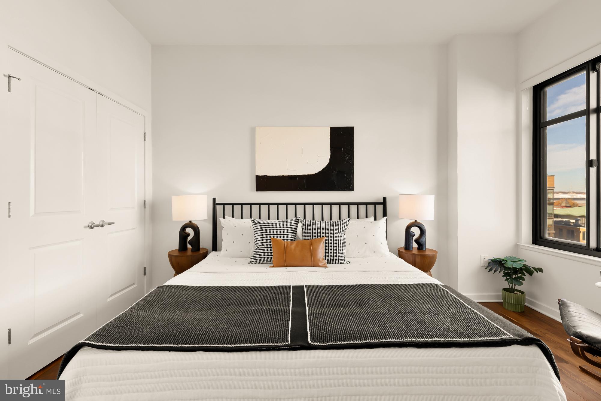 475 K Street Northwest, Unit 1126 Washington, DC 20001 - Photo 20 of 51 a bedroom with a bed and a window