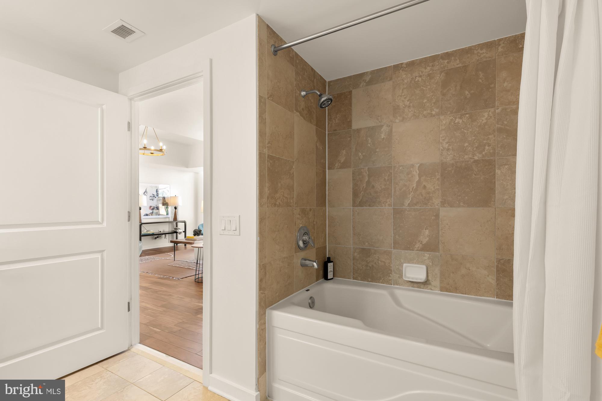 475 K Street Northwest, Unit 1126 Washington, DC 20001 - Photo 25 of 51 a bathroom with a bathtub and a shower