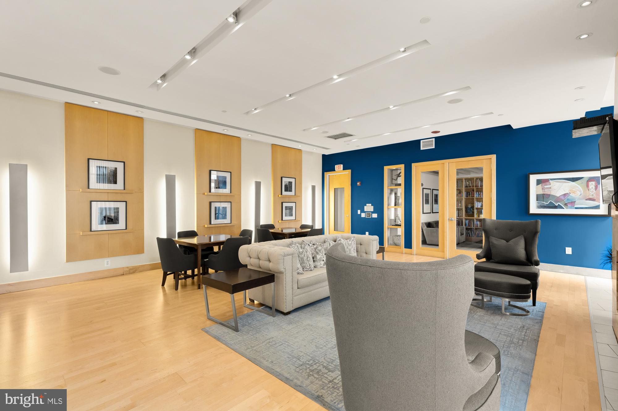 475 K Street Northwest, Unit 1126 Washington, DC 20001 - Photo 34 of 51 a living room with fireplace furniture and a table