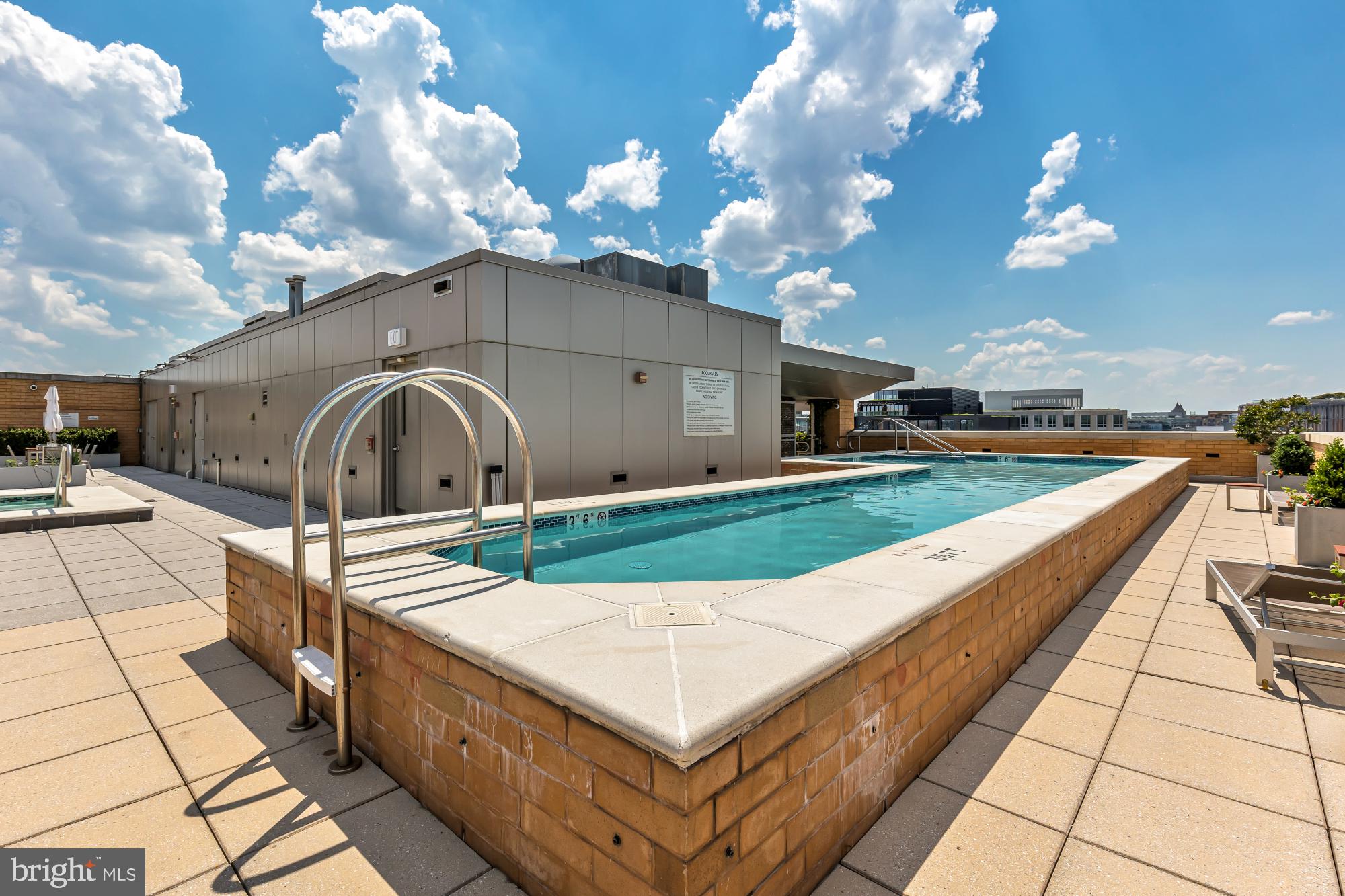 475 K Street Northwest, Unit 1126 Washington, DC 20001 - Photo 38 of 51 a swimming pool with yard and outdoor seating