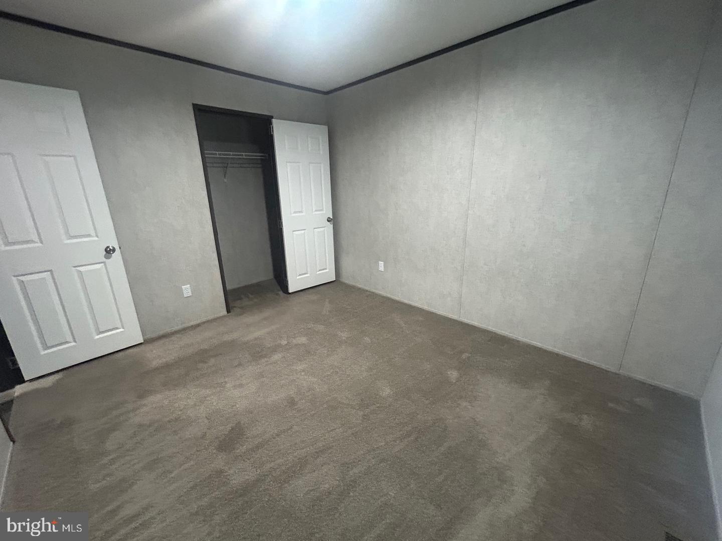 2501 Tilton Road, Unit 323 Egg Harbor Township, NJ 08234 - Photo 5 of 9 an empty room with windows