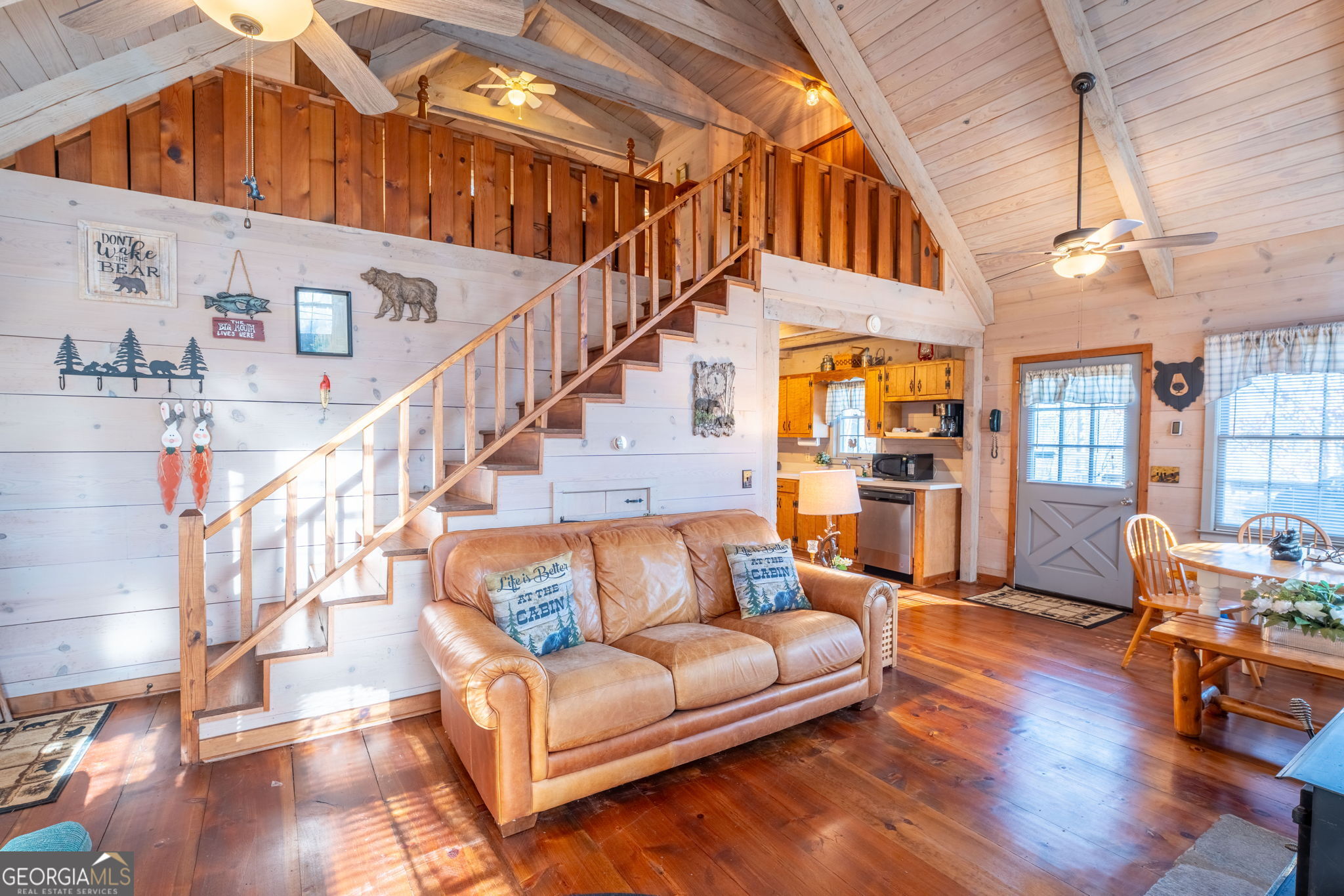 220 McConnell Court Helen, GA 30545 - Photo 13 of 37 a view of living room filled with furniture and wooden floor