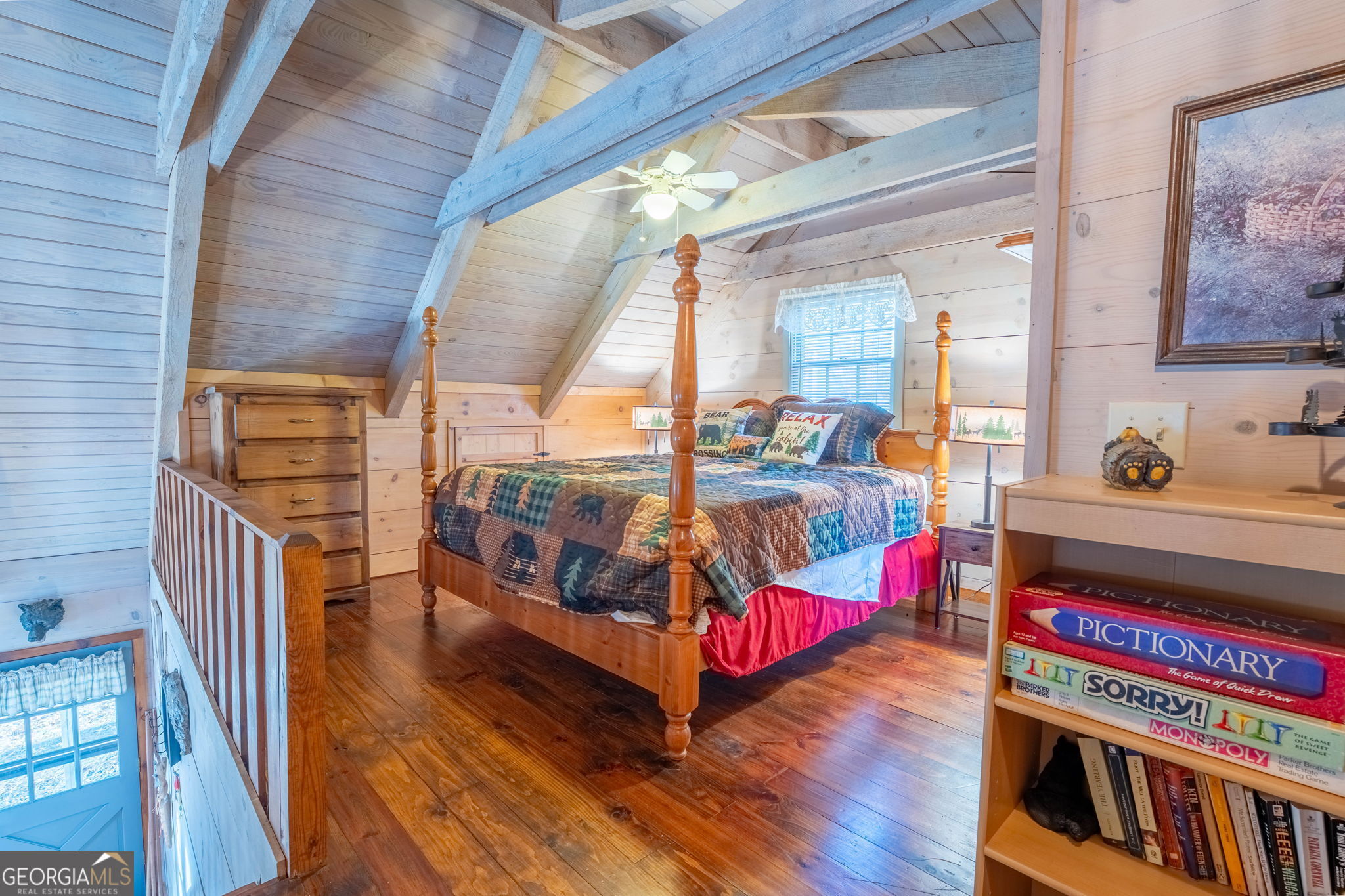 220 McConnell Court Helen, GA 30545 - Photo 20 of 37 a living room with furniture a rug and a large window
