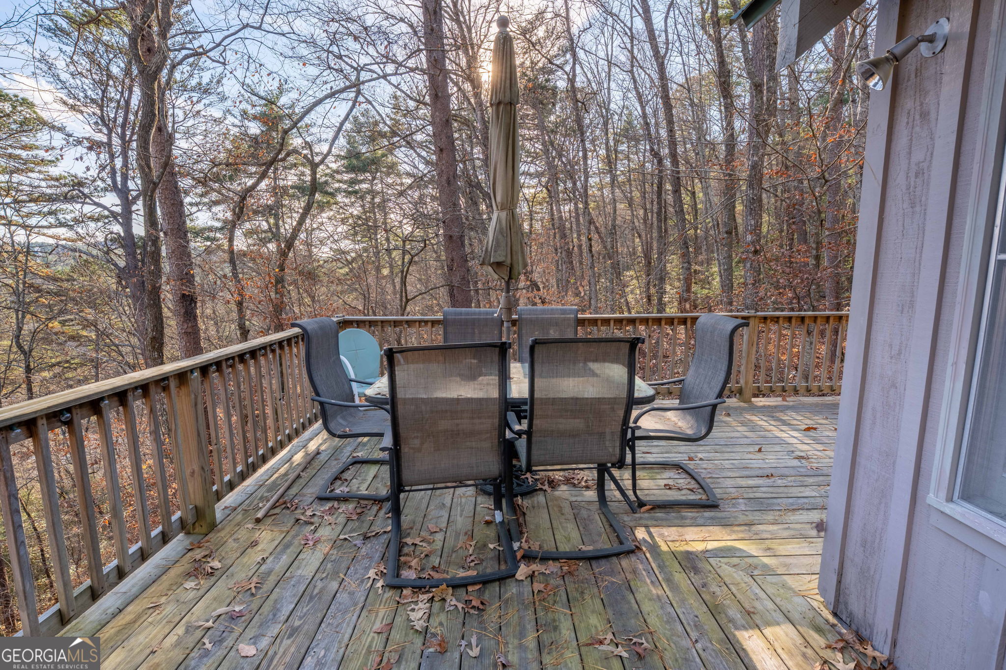 220 McConnell Court Helen, GA 30545 - Photo 26 of 37 a view of balcony with wooden floor and outdoor seating