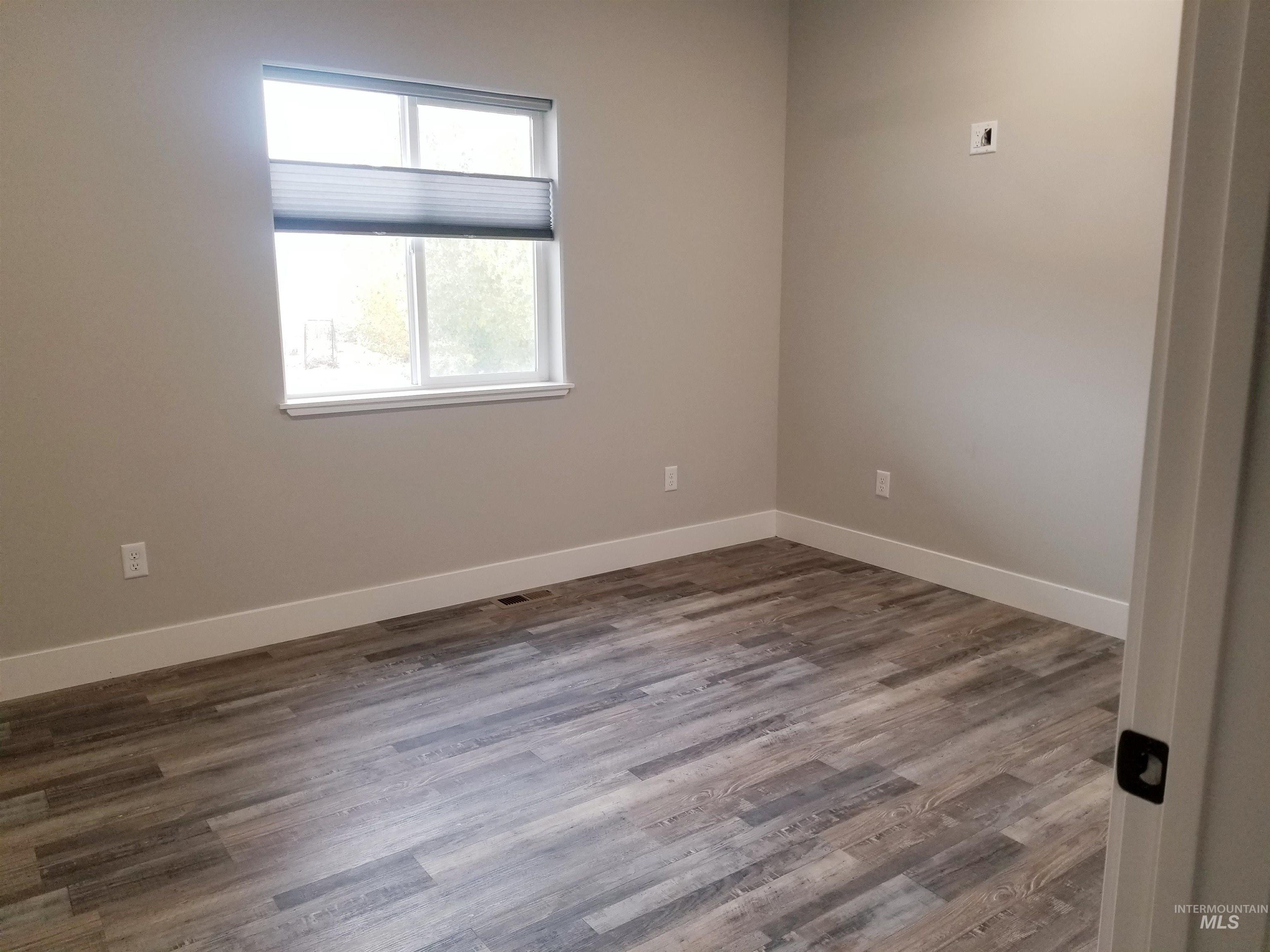 212 Fafnir Drive Kimberly, ID 83341 - Photo 20 of 36 Spare room featuring dark wood finished floors