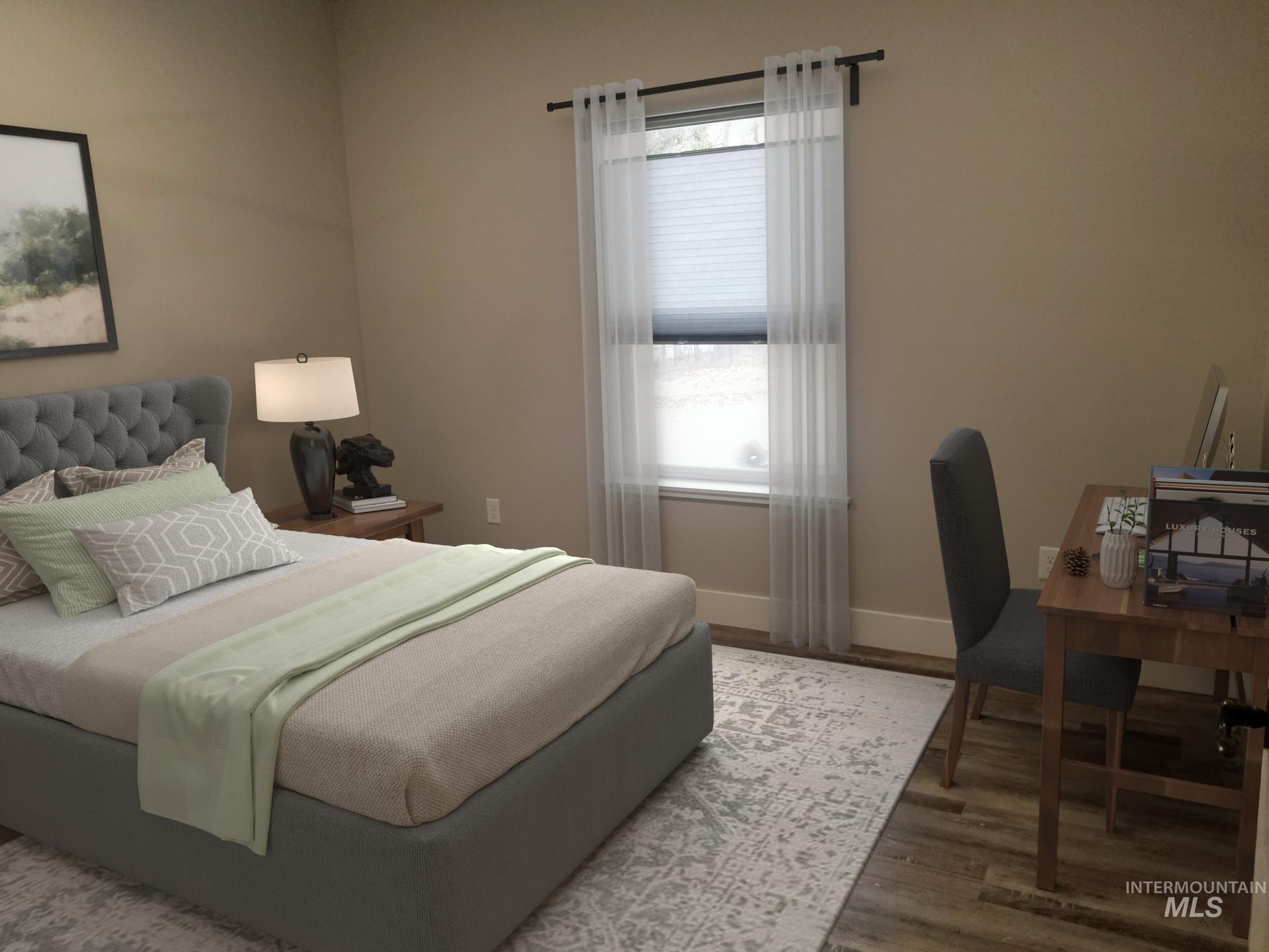 212 Fafnir Drive Kimberly, ID 83341 - Photo 22 of 36 Bedroom with wood finished floors and a desk