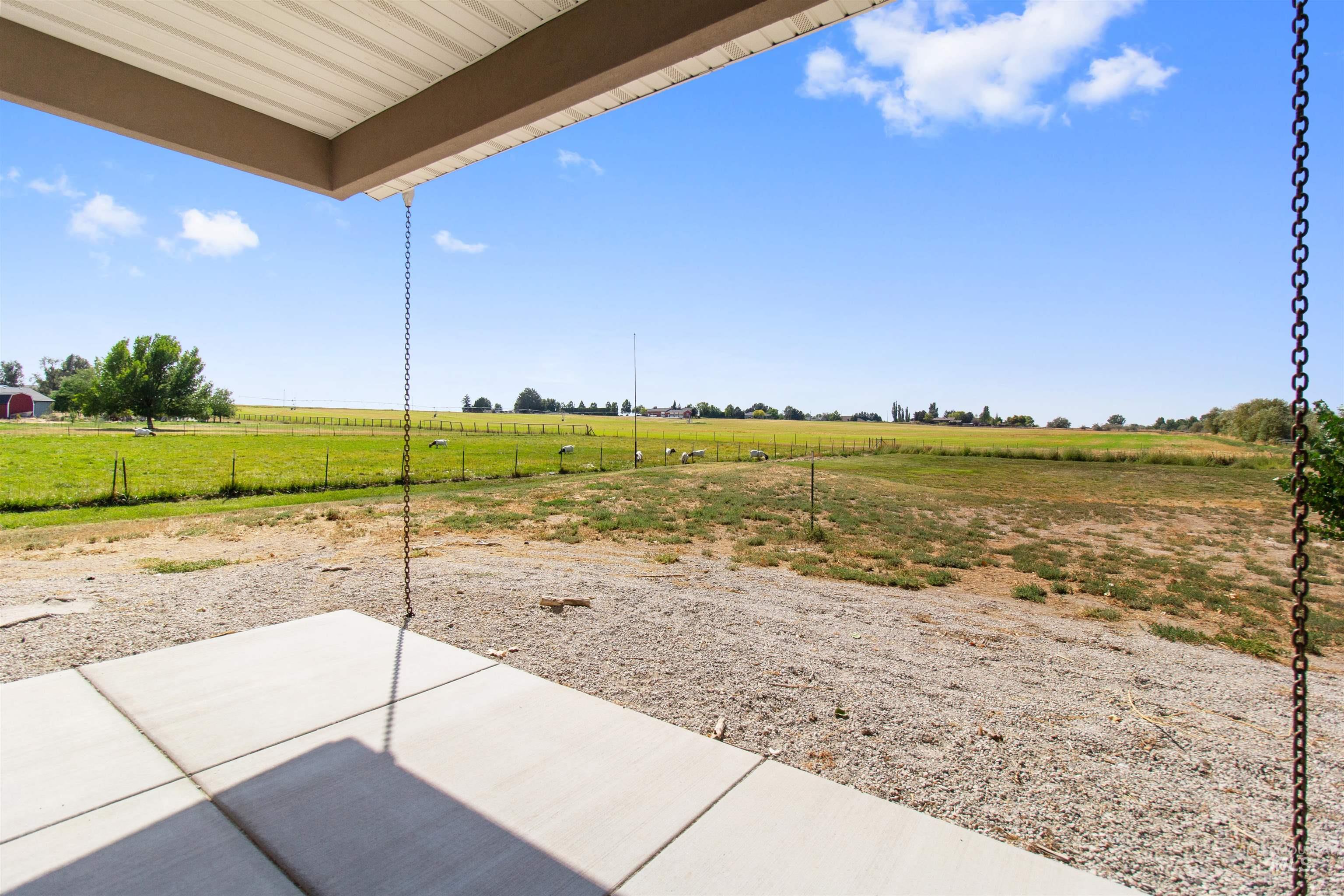 212 Fafnir Drive Kimberly, ID 83341 - Photo 26 of 36 View of patio / terrace featuring a rural view
