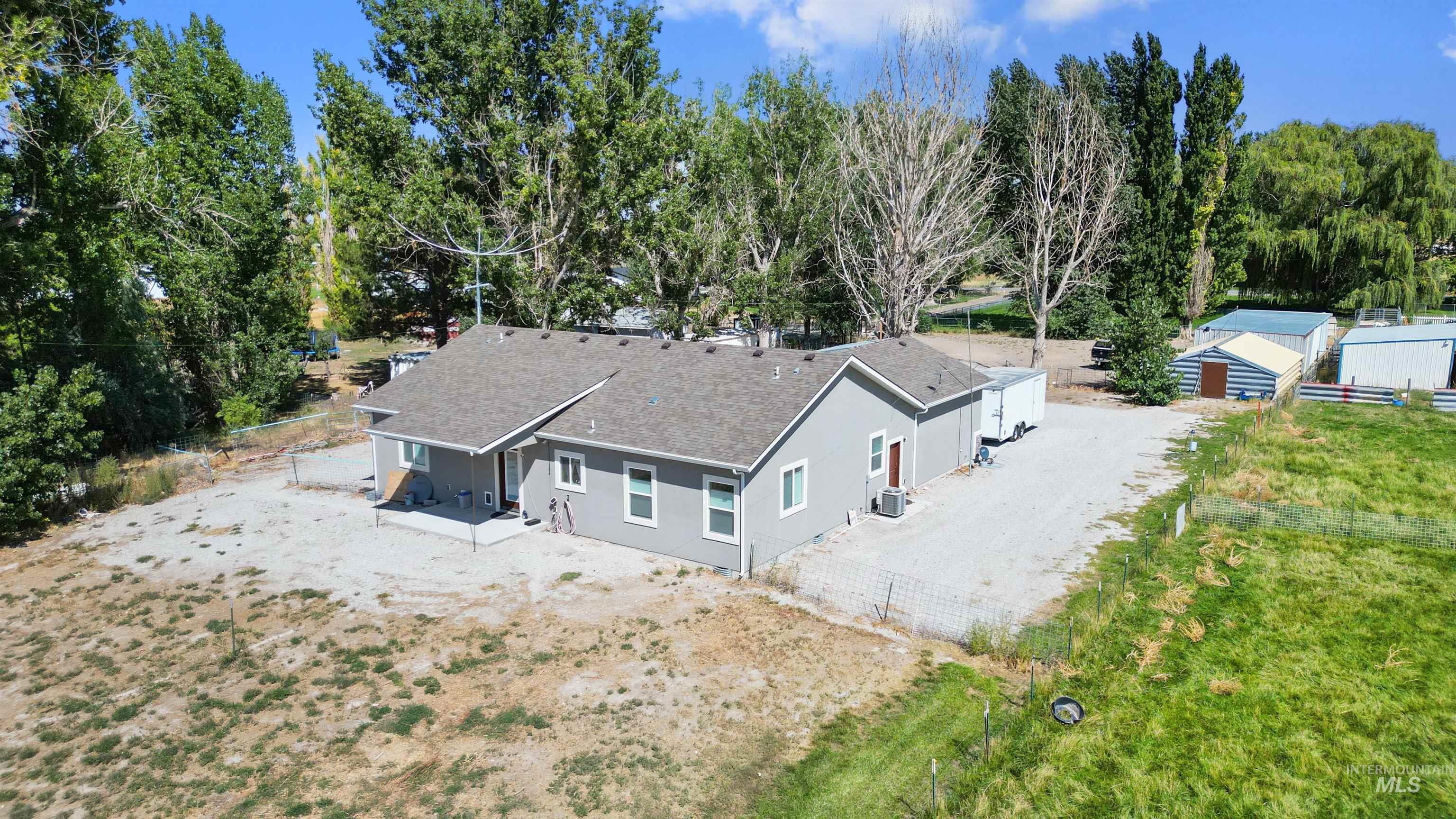 212 Fafnir Drive Kimberly, ID 83341 - Photo 33 of 36 Aerial view of property and surrounding area with a tree filled landscape