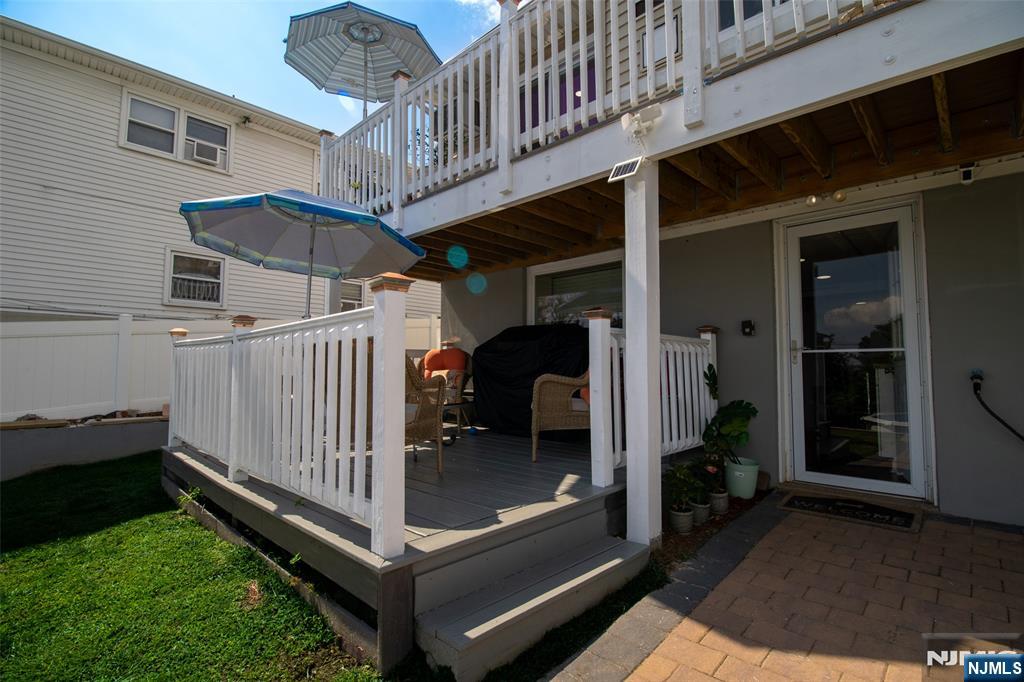 88 Columbia Street Wood-Ridge, NJ 07075 - Photo 24 of 32 a view of a porch with furniture and garden