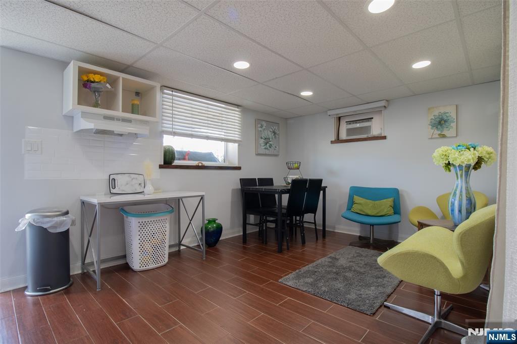 88 Columbia Street Wood-Ridge, NJ 07075 - Photo 28 of 32 a living room with furniture and a table