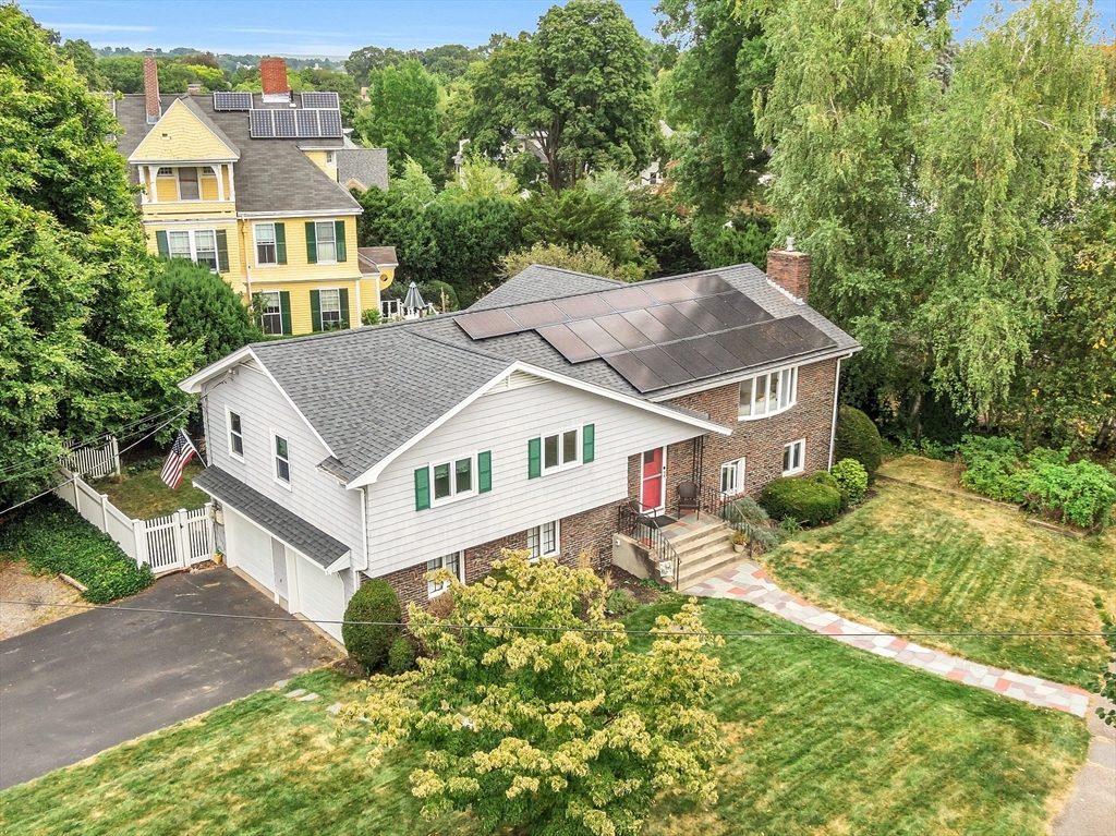 75 Nonantum Street Newton, MA 02458 - Photo 3 of 41 an aerial view of residential house with a yard and large trees