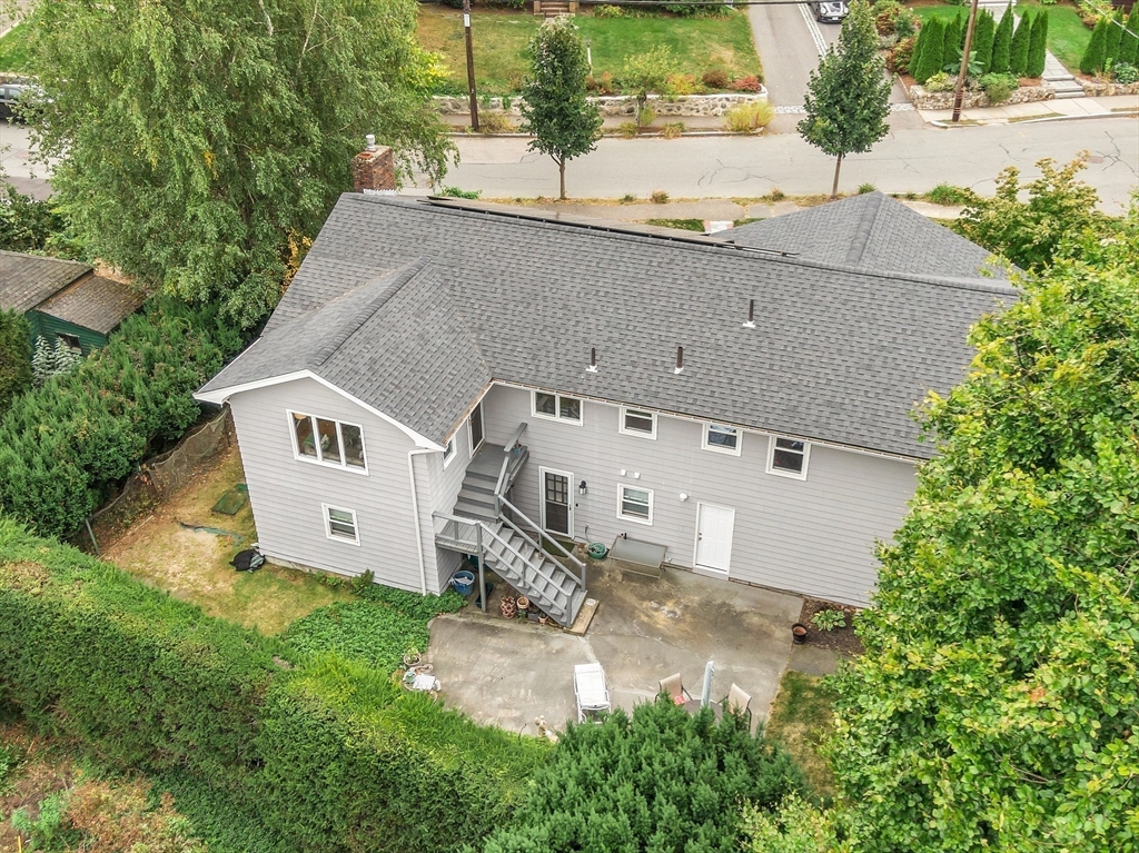 75 Nonantum Street Newton, MA 02458 - Photo 32 of 41 an aerial view of residential house with outdoor space and trees around