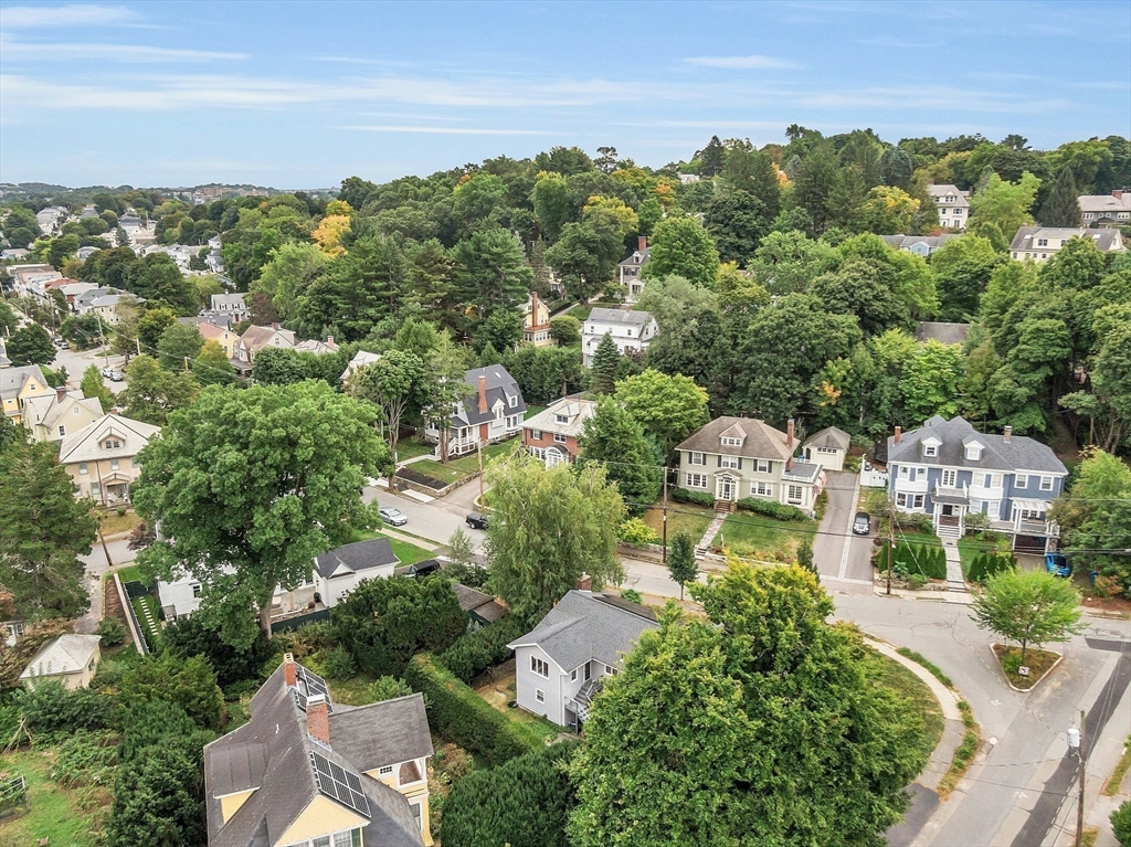 75 Nonantum Street Newton, MA 02458 - Photo 34 of 41 an aerial view of residential houses with outdoor space and trees