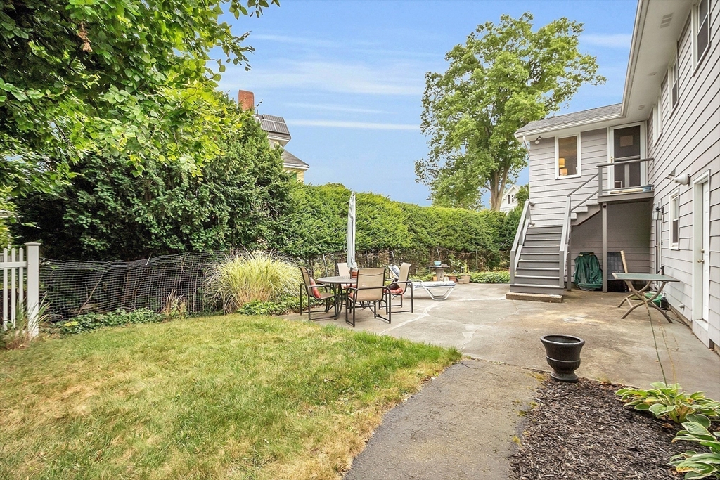 75 Nonantum Street Newton, MA 02458 - Photo 5 of 41 a view of a backyard with a sitting area
