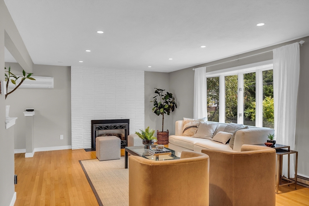 75 Nonantum Street Newton, MA 02458 - Photo 6 of 41 a living room with furniture and a large window