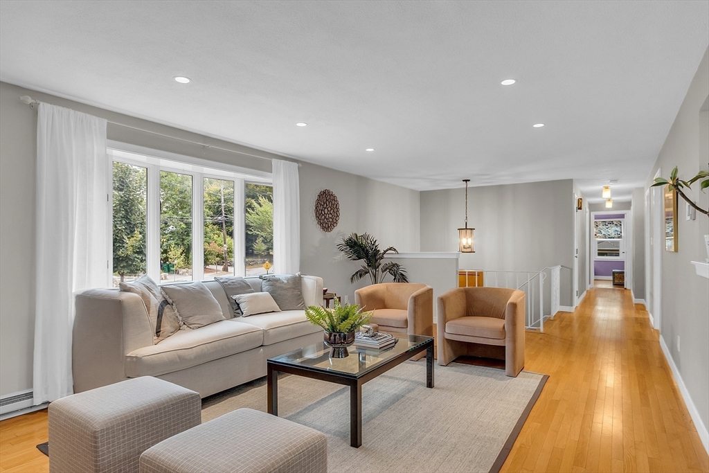 75 Nonantum Street Newton, MA 02458 - Photo 7 of 41 a living room with furniture and a large window