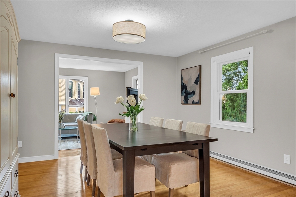 75 Nonantum Street Newton, MA 02458 - Photo 9 of 41 a view of a dining room with furniture and wooden floor