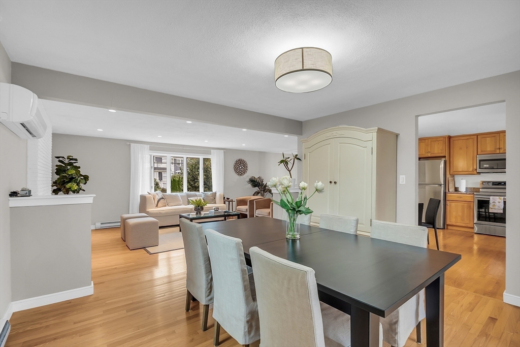 75 Nonantum Street Newton, MA 02458 - Photo 10 of 41 a view of a dining room with furniture and wooden floor