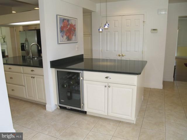 24700 Kings Valley Road Damascus, MD 20872 - Photo 14 of 30 Kitchen 2nd island with wine chiller