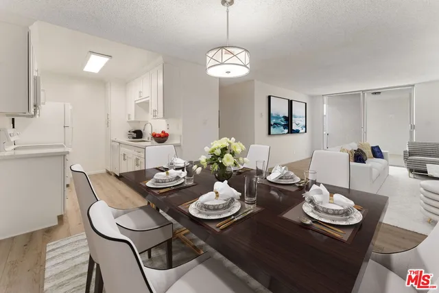 a view of a dining room and chandelier